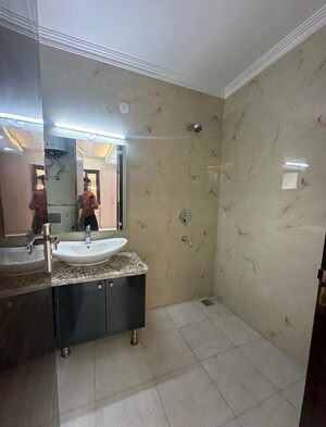 Bathroom in 3 BHK Builder Floor at Freedom Fighters Enclave – for Sale