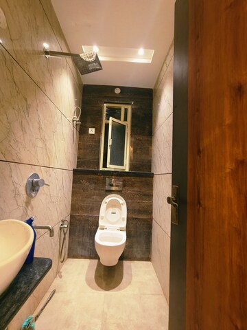 Bathroom in 3 BHK Builder Floor at Dwarka Mor – for Rent