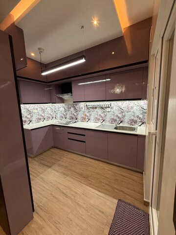 Kitchen in 2 BHK Apartment at Bhartiya City Nikoo Homes II, Thanisandra Main Road – for Sale