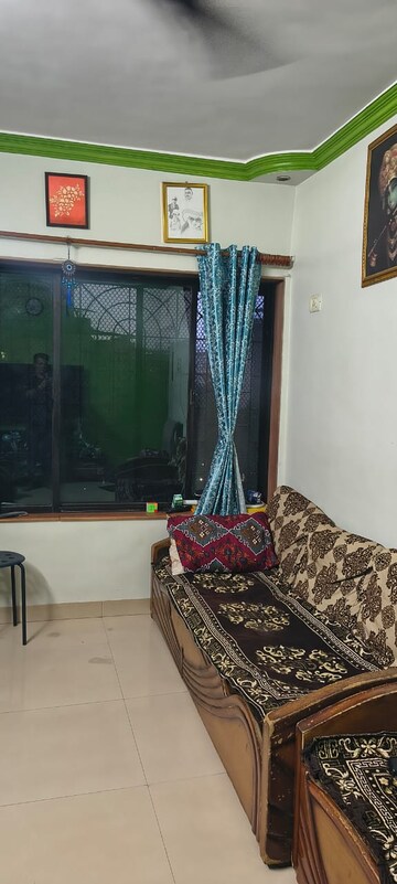 Living Room in 1 BHK Apartment at Brahmand – for Rent