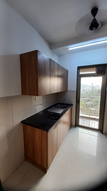 Kitchen in 2 BHK Apartment at Lodha Splendora, Ghodbunder Road – for Rent