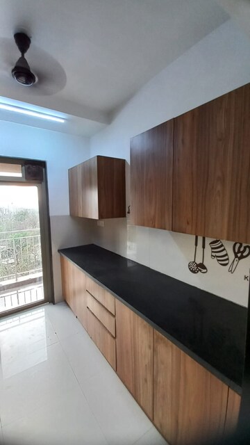 Kitchen in 2 BHK Apartment at Lodha Splendora, Ghodbunder Road – for Rent