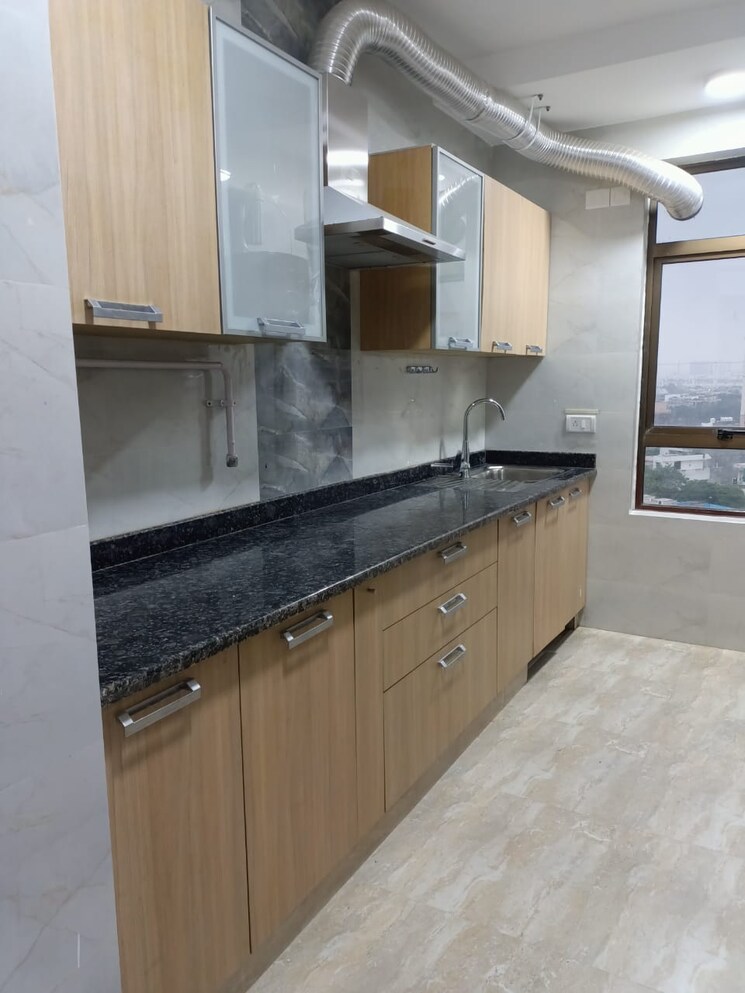 Kitchen, orchid-petals 3 Bedroom 2061 Sq.Ft. Apartment In Sector 49 Gurgaon 9023472