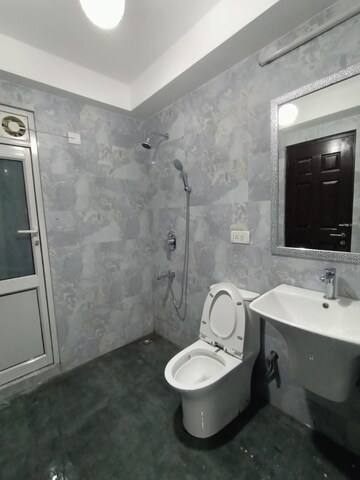 Bathroom in 3 BHK Apartment at Orchid Petals, Sector 49 – for Sale