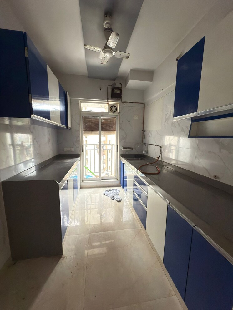 Kitchen, vihang-vermont 2 Bedroom 664 Sq.Ft. Apartment In Ghodbunder Road Thane 9023560