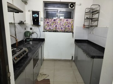 Kitchen in 1.5 BHK Apartment at Amanora Future Towers, Hadapsar – for Rent