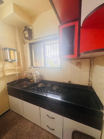 Kitchen in 1 BHK Apartment at Jyoti Complex, Goregaon East – for Rent