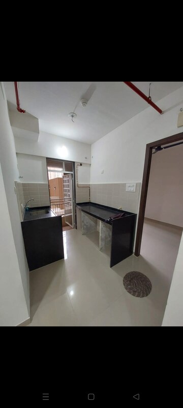 Kitchen in 1 BHK Apartment at JP North Aviva, Mira Road – for Rent