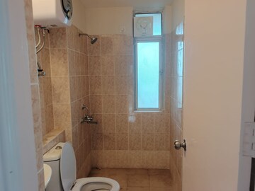 Bathroom in 2 BHK Apartment at Shapoorji Pallonji Joyville Gurgaon, Sector 102 – for Rent