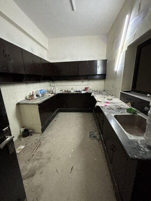 Kitchen in 4 BHK Apartment at HIG Flats, Sector 99 – for Sale