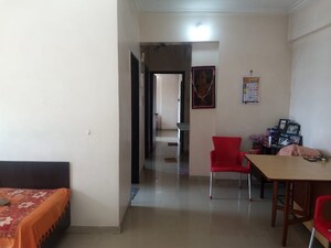 Living Room in 2 BHK Apartment at Coral Heights, Kavesar – for Sale