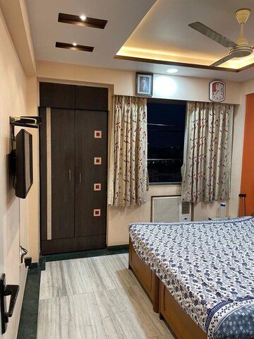 Bedroom in 2 BHK Apartment at Hiranandani Estate Greenwood, Ghodbunder Road – for Rent