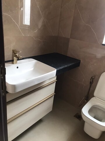 Bathroom in 3 BHK Apartment at Smart World Orchard, Sector 61 – for Rent