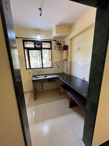 Kitchen in 1 BHK Apartment at Hiranandani Estate Brentford, Ghodbunder Road – for Rent