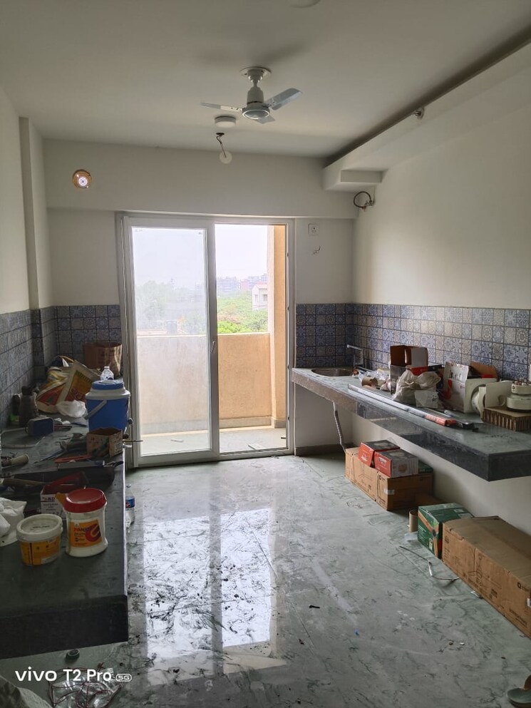 Kitchen, tulip-yellow 3 Bedroom 1704 Sq.Ft. Apartment In Sector 69 Gurgaon 9023930