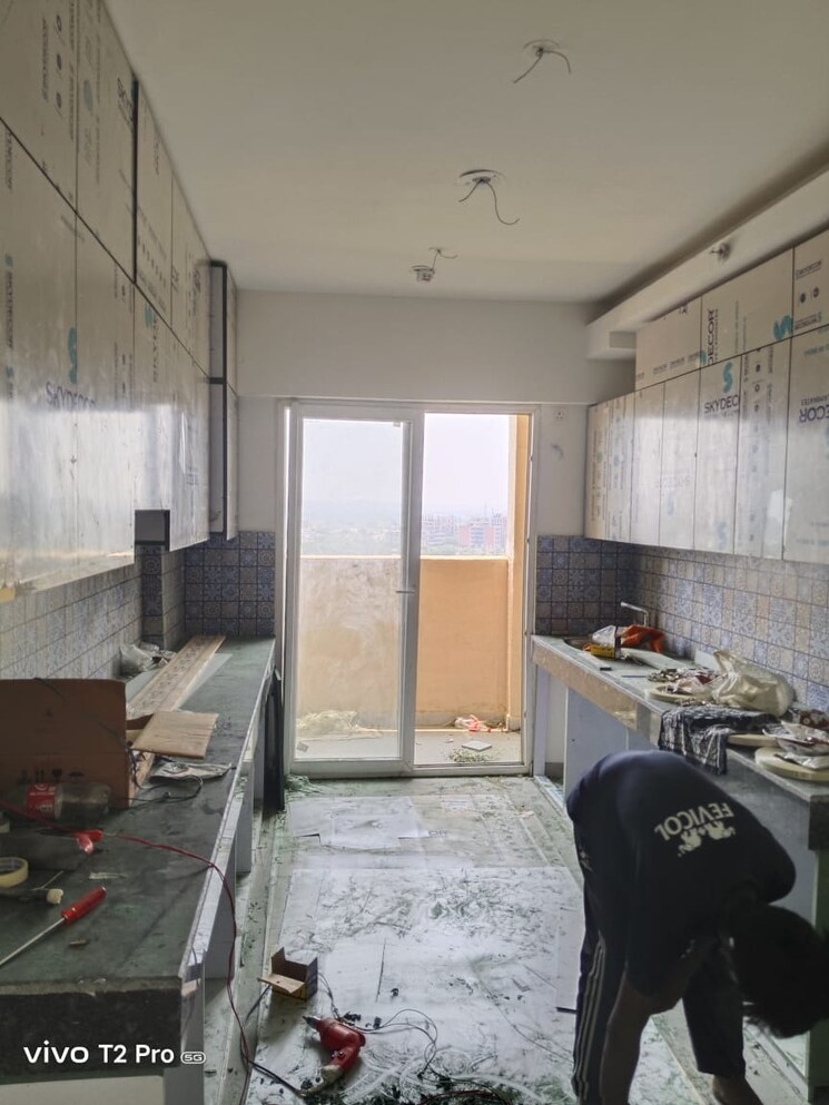 Kitchen/pantry, tulip-yellow 3 Bedroom 1704 Sq.Ft. Apartment In Sector 69 Gurgaon 9023930