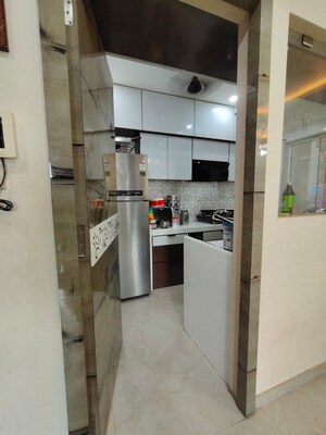 Kitchen in 2 BHK Apartment at Dosti West County, Balkum Pada – for Sale