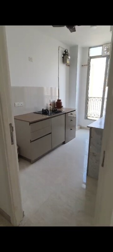 Kitchen in 1 BHK Apartment at Hiranandani Estate Solitaire C, Ghodbunder Road – for Rent
