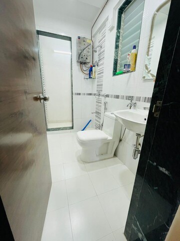 Bathroom in 2 BHK Apartment at Mahavir Kalpavruksha, Ghodbunder Road – for Sale