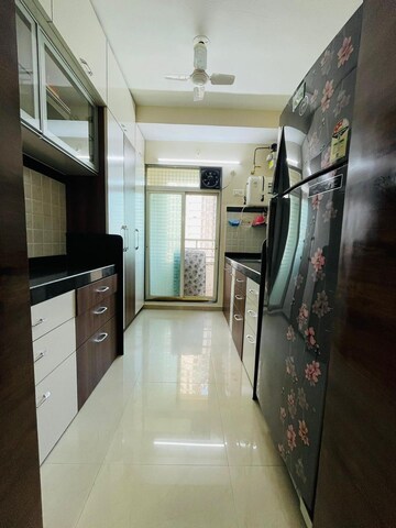 Kitchen in 2 BHK Apartment at Mahavir Kalpavruksha, Ghodbunder Road – for Sale