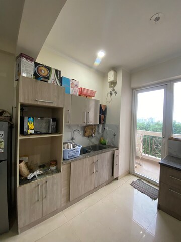 Kitchen in 3.5 BHK Apartment at Affinity Greens, International Airport Road – for Rent