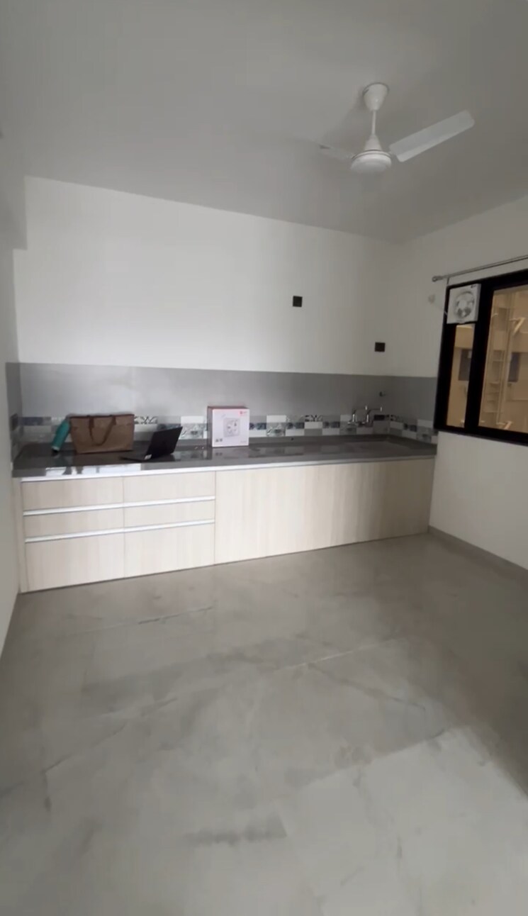 Kitchen, unique-youtopia 2 Bedroom 1000 Sq.Ft. Apartment In Kharadi Pune 9024047