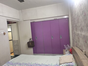 Bedroom in 2 BHK Apartment at Green Acres Apartment, Waghbil – for Rent