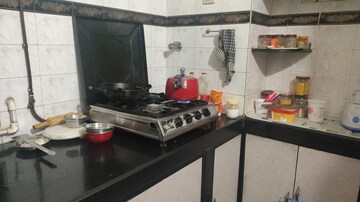 Kitchen in 2 BHK Apartment at Green Acres Apartment, Waghbil – for Rent