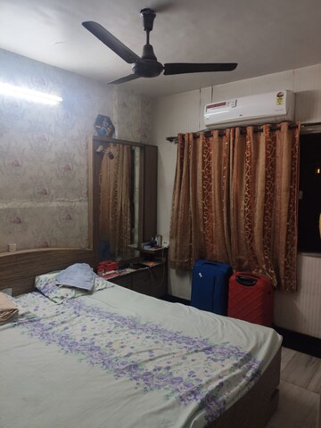 Bedroom in 2 BHK Apartment at Green Acres Apartment, Waghbil – for Rent