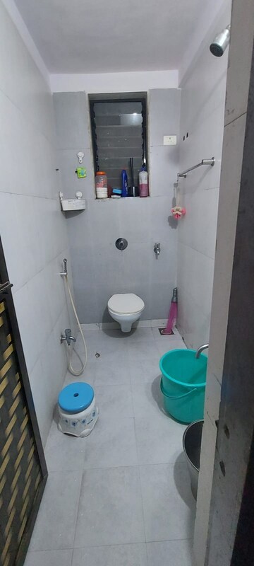 Bathroom in 1 BHK Apartment at Kanha CHS, Kopar Khairane – for Rent