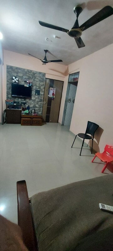 Living Room in 1 BHK Apartment at Kanha CHS, Kopar Khairane – for Rent