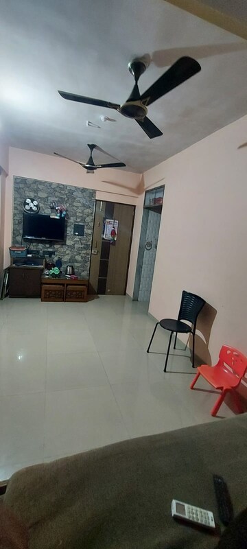 Living Room in 1 BHK Apartment at Kanha CHS, Kopar Khairane – for Rent