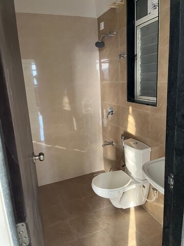 Bathroom in 1 BHK Apartment at Ajmera Crosstown One, Kalyan West – for Rent