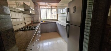 Kitchen in 3 BHK Apartment at Dn Nagar – for Rent
