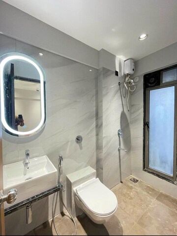 Bathroom in 3 BHK Apartment at Axiom Rudra, Goregaon West – for Rent