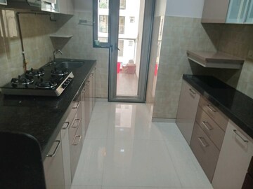 Kitchen in 3 BHK Apartment at Adani Western Heights Sky Apartments, Andheri West – for Rent