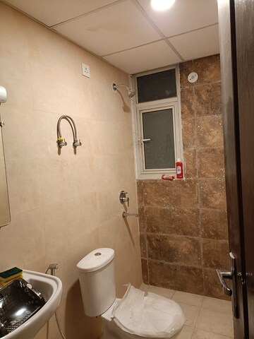 Bathroom in 3 BHK Apartment at Omaxe Waterscapes, Gomti Nagar – for Rent