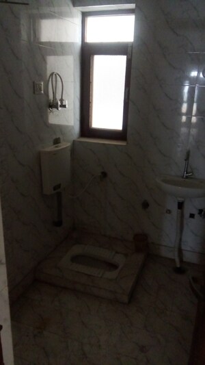 Bathroom in 4 BHK Apartment at Parker White Lily, Sector 8 – for Sale