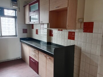 Kitchen in 3 BHK Apartment at Ashar Residency, Pokhran Road No Two – for Rent