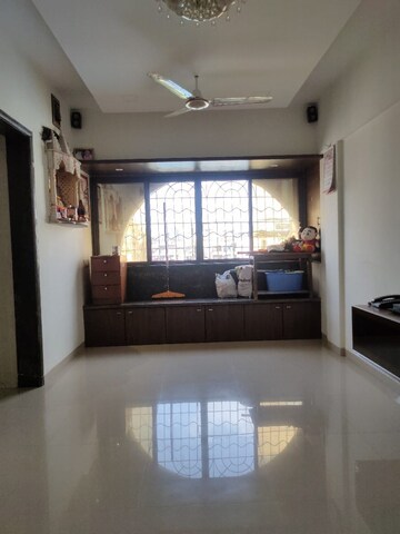 Living Room in 1 BHK Apartment at Liberty Corner CHS, Mira Road – for Rent