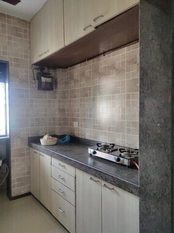 Kitchen in 1 BHK Apartment at Liberty Corner CHS, Mira Road – for Rent