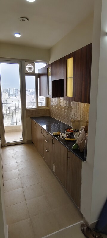 Kitchen in 3 BHK Apartment at Amrapali Crystal Homes, Sector 76 – for Rent
