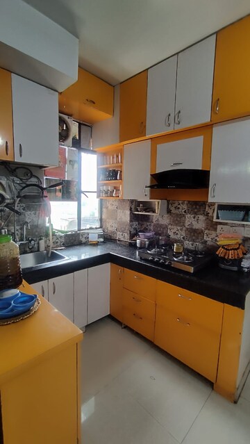 Kitchen in 1 BHK Apartment at Signature Global Synera, Sector 81 – for Sale