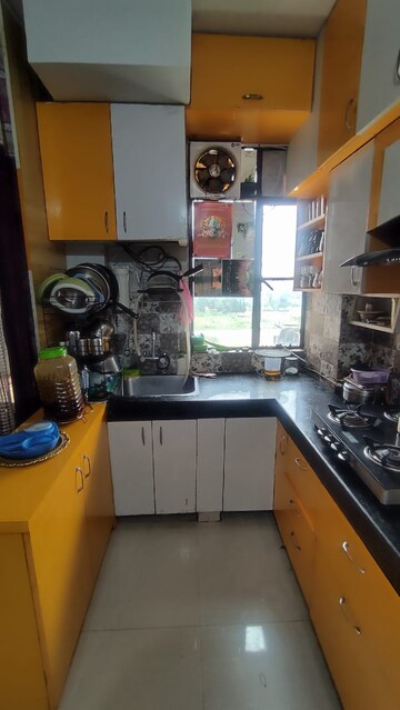 Kitchen in 1 BHK Apartment at Signature Global Synera, Sector 81 – for Sale