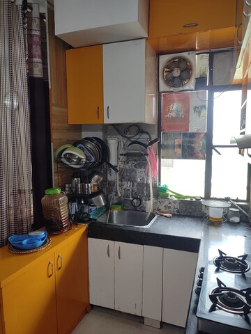 Kitchen in 1 BHK Apartment at Signature Global Synera, Sector 81 – for Sale