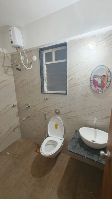 Bathroom in 3 BHK Apartment at Triaa Kosmic Kourtyard, Wagholi – for Rent