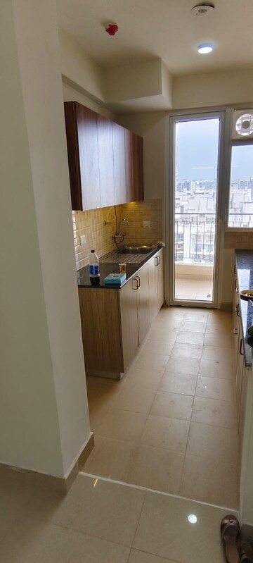 Kitchen in 3 BHK Apartment at Amrapali Crystal Homes, Sector 76 – for Rent