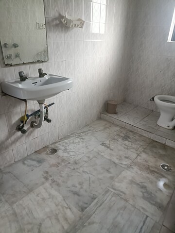 Bathroom in 1.5 BHK Independent House at RWA Apartments, Sector 31 – for Rent