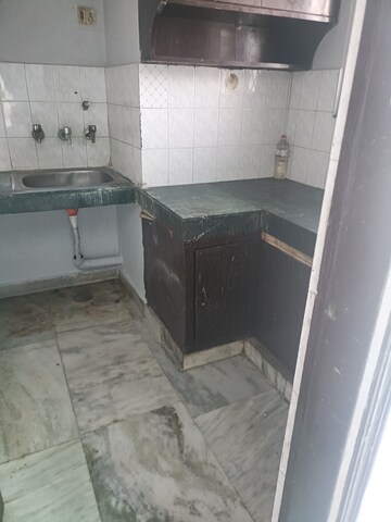 Kitchen in 1.5 BHK Independent House at RWA Apartments, Sector 31 – for Rent