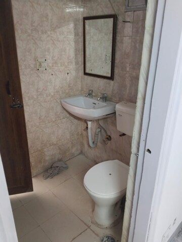 Bathroom in 3 BHK Apartment at Sector 6 Dwarka – for Rent